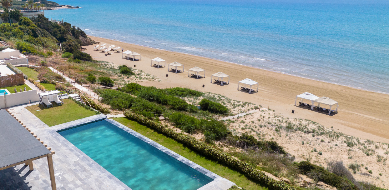 01-royal-pavilion-indoor-and-outdoor-pool-luxury-resort-grecotel